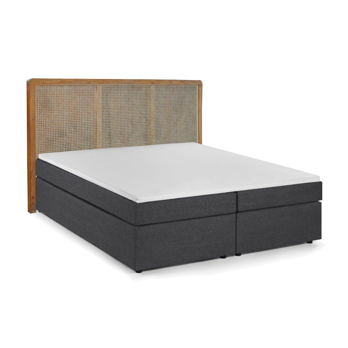 Boxspringbett mit Rattan-Kopfteil